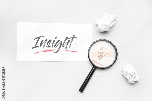 Word INSIGHT, crumpled pape...
