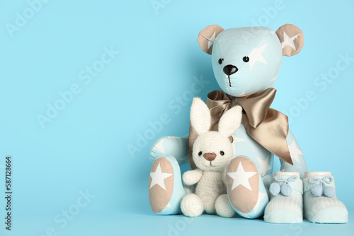 Toy bear and bunny with bab...