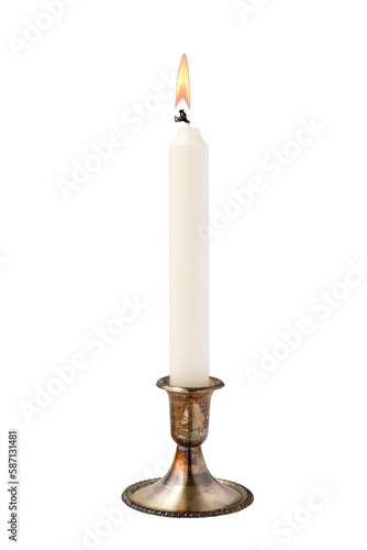 White candle in an antique silver candleholder isolated cutout on transparent photo