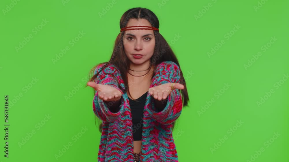 Free gifts, presents for you. Young woman opening hands, glad to see, excitement, preparing surprise, sharing love emotions, congratulating. Girl isolated alone on chroma key background, green screen Free gifts, presents for you. Young woman opening hands, glad to see, excitement, preparing surprise, sharing love emotions, congratulating. Girl isolated alone on chroma key background, green screen