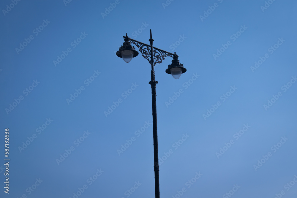 street lamp on blue sky. Modern street light isolated street lamp on blue sky. Modern street light isolated