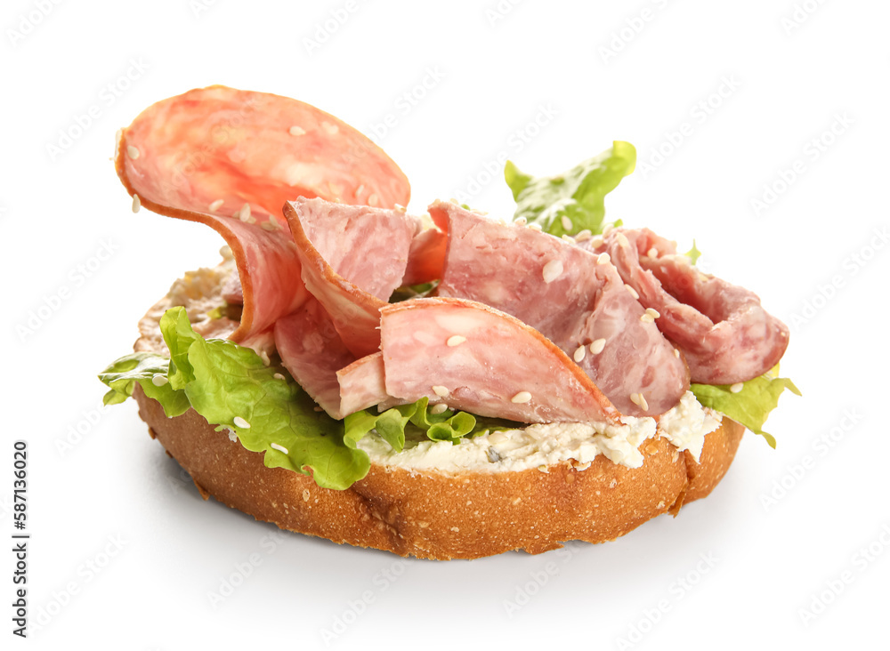 Tasty ham bruschetta with lettuce on white background