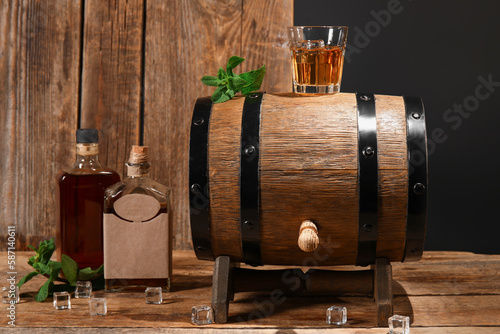 Whiskey barrel with glass o...