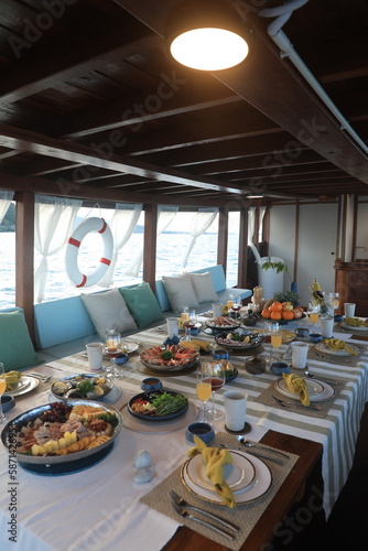 Dining table located on a cruise ship Tourist boats, seafood, drinks
