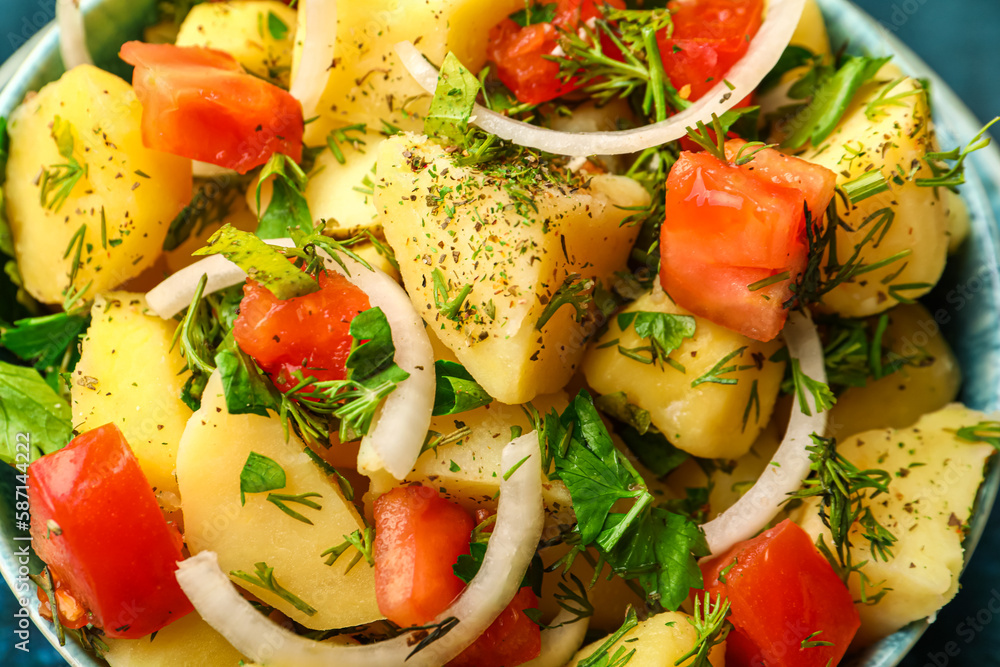 Bowl of tasty Potato Salad with vegetables, closeup Bowl of tasty Potato Salad with vegetables, closeup