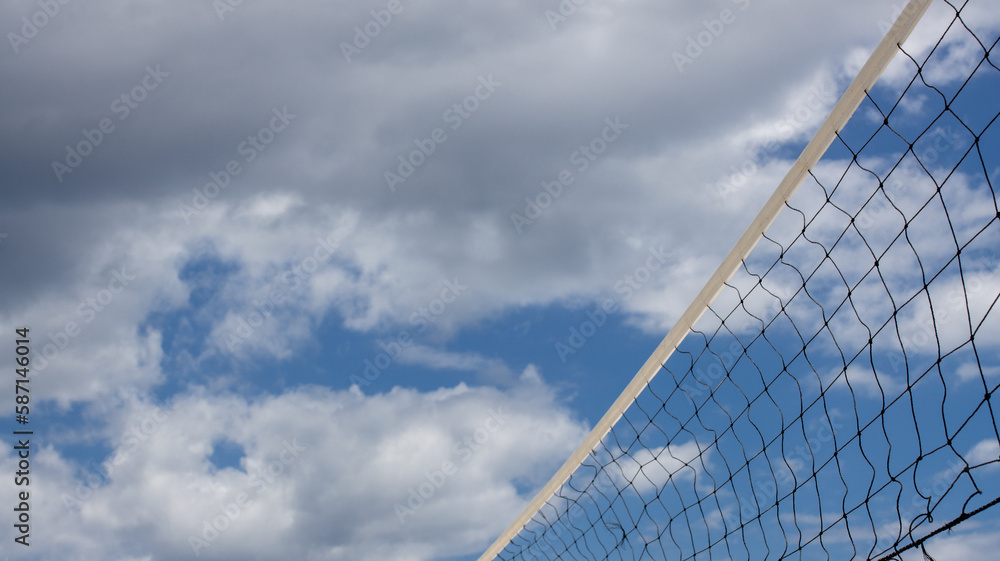 net for volleyball and tennis, on the beach, on a sunny day, background to illustrate an active lifestyle net for volleyball and tennis, on the beach, on a sunny day, background to illustrate an active lifestyle