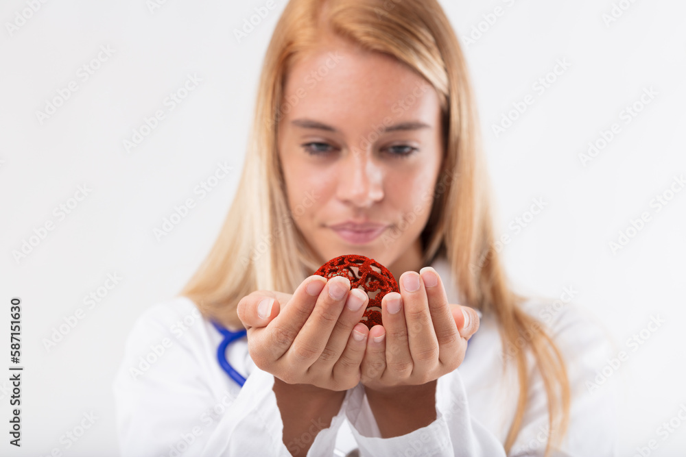Blurred woman, hands in focus, red decoration Blurred woman, hands in focus, red decoration