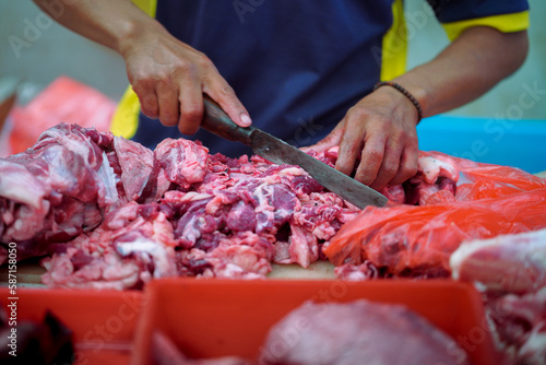 Close up shot of beef is being cut