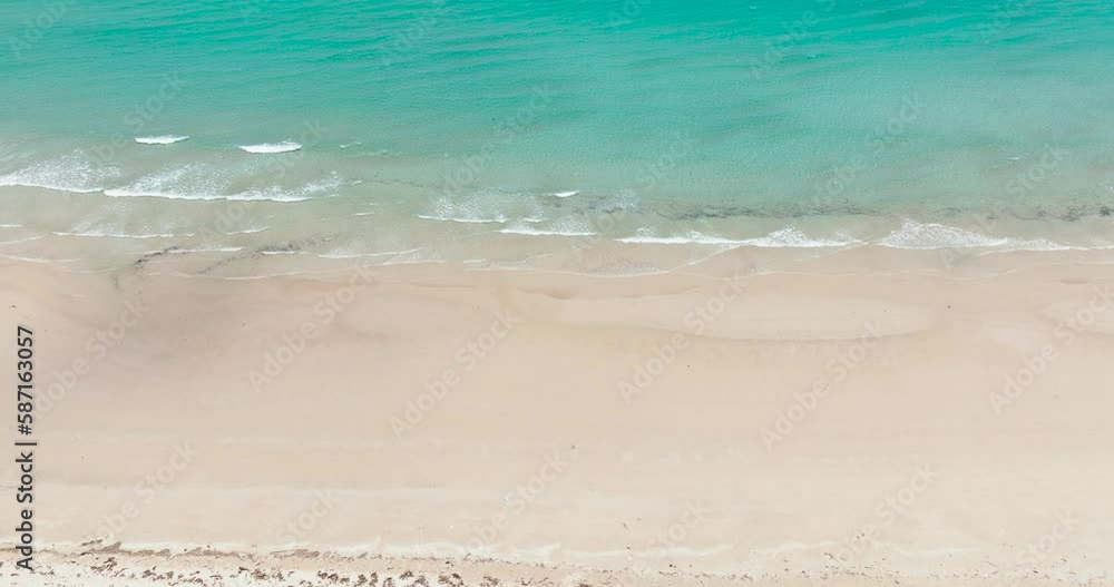 Aerial view of beautiful sandy beach and sea surf with waves. Borneo, Malaysia. Aerial view of beautiful sandy beach and sea surf with waves. Borneo, Malaysia.