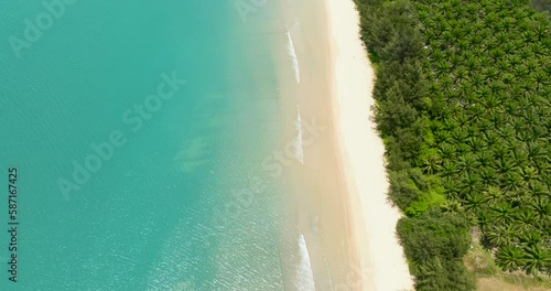 Aerial drone of sandy beach and turquoise water in the tropics. Borneo, Malaysia. photo