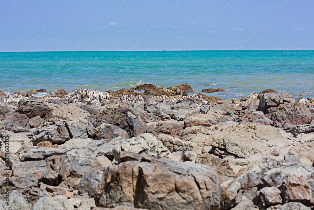Rocks lost beach in the summer sea of Thailand. Rocks lost beach in the summer sea of Thailand.