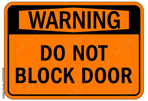 Door safety sign and labels do not block door