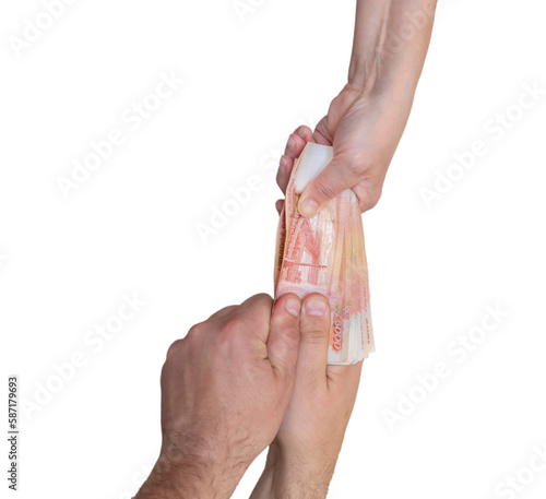 A woman's and a man's hand are arguing for money of 5000 rubles. Isolated on a white background.