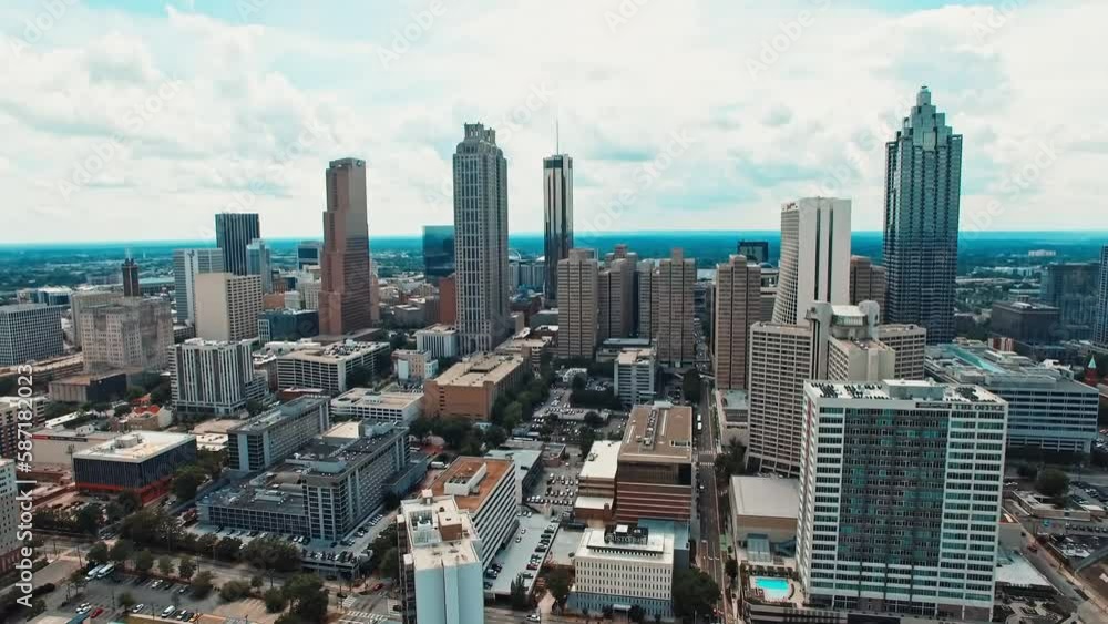 Drone flight over Atlanta city with huge skyscrapers and office buildings Drone flight over Atlanta city with huge skyscrapers and office buildings
