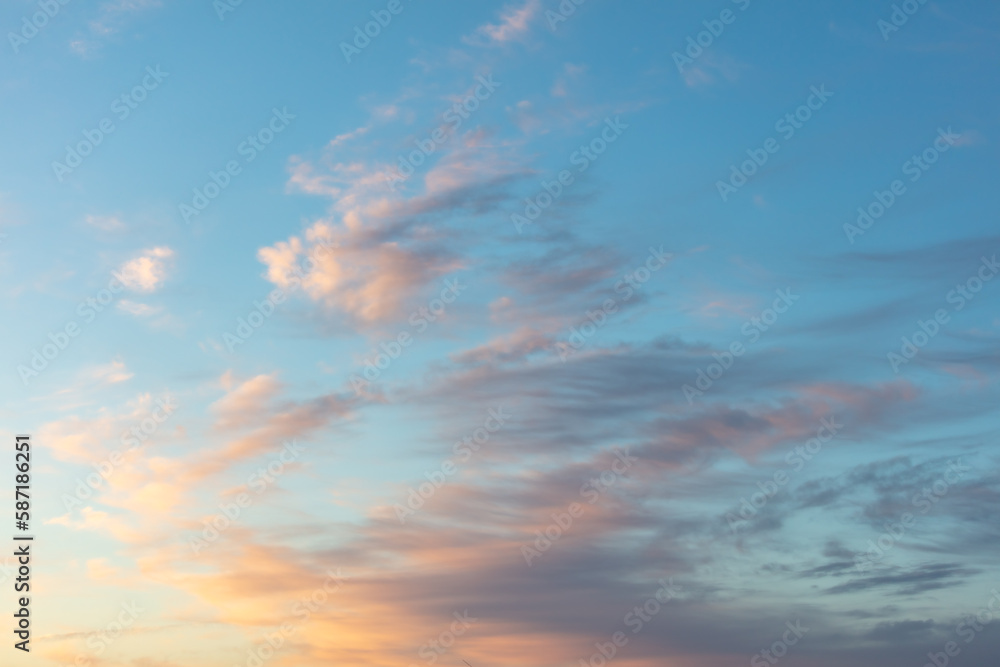 Colorful clouds in the sky at sunset. Background