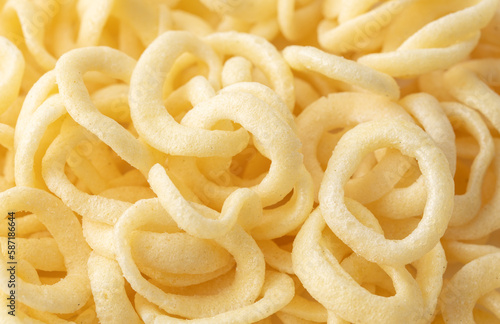 Onion ring chips as a background.