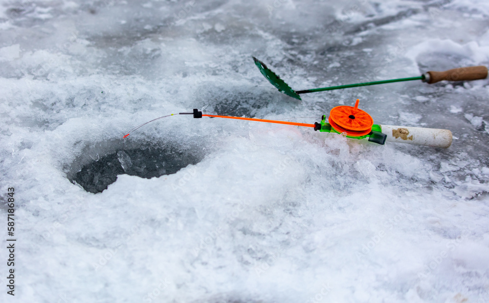 Naklejka premium Fishing rod for winter ice fishing. Close-up.