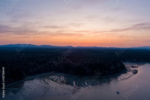 Sailboats on the Puget Sound at sunset © Cavan