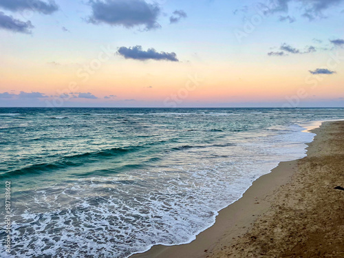 Canvas Print Carribean beach and waves at sunset