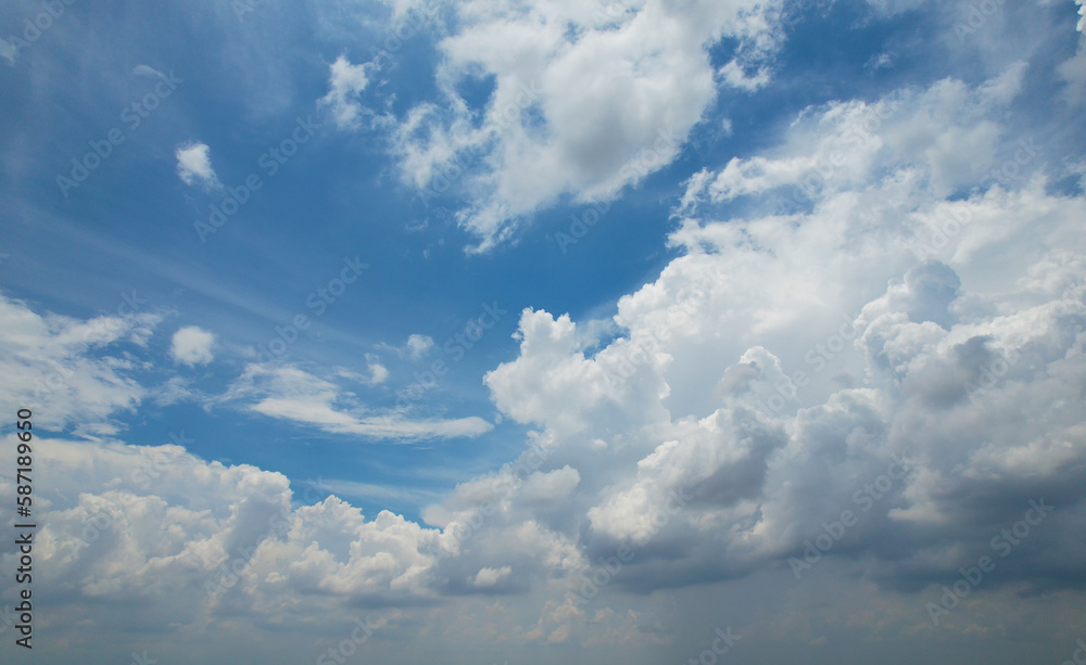 Massive clusters of clouds that merge beautifully cover the sky. with soft afternoon ligh, Sky background. Massive clusters of clouds that merge beautifully cover the sky. with soft afternoon ligh, Sky background.