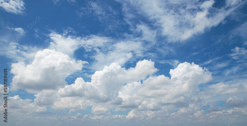 Beautiful white clouds cover the sky giving off a peaceful feeling, Sky background. Beautiful white clouds cover the sky giving off a peaceful feeling, Sky background.