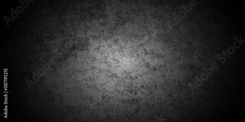 Dark black background with texture Close up retro plain black color cement wall panoramic background. texture for show or advertise. Empty concrete wall with black cement wall texture background.