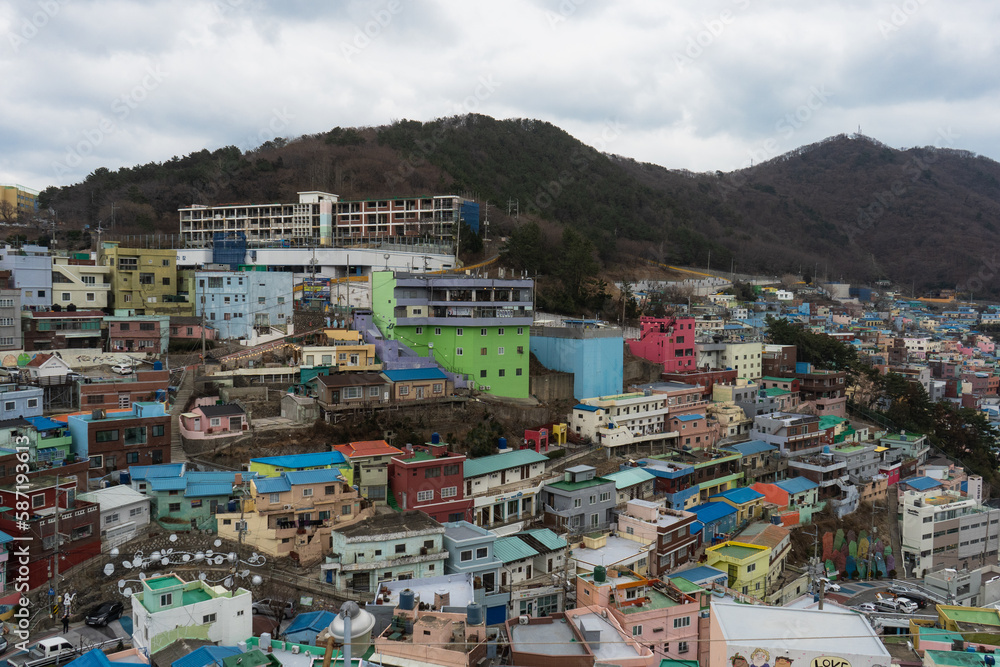Fototapeta premium Gamcheon Culture Village with colorful houses murals shops and cafe during winter afternoon at Saha-gu , Busan South Korea : 9 February 2023