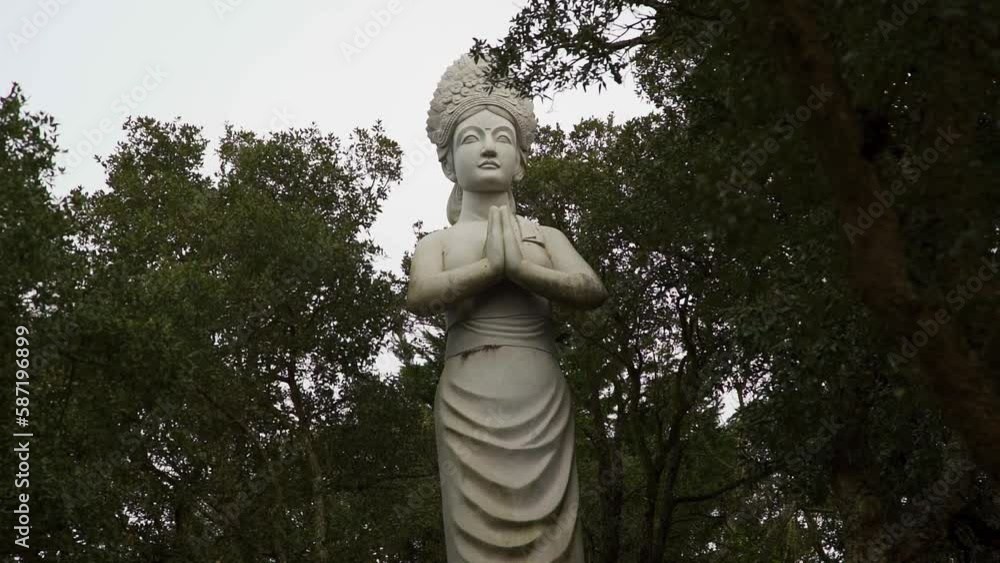 Praying Statue in Secret Garden Praying Statue in Secret Garden