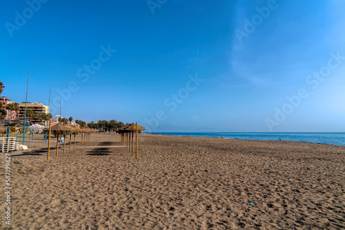 Carihuela playa between Torremolinos and Benalmadena with beach umbrellas Andalusia Costa del Sol Spain photo