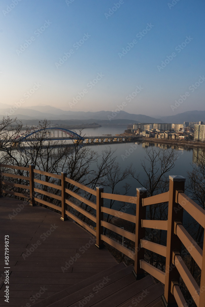 Chuncheon cityscape and panoramic view of Soyang River and buildings during winter evening at Chuncheon , South Korea : 11 February 2023