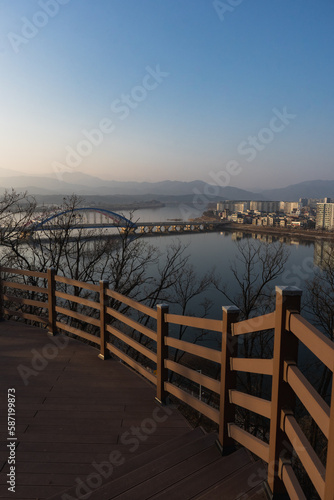 Chuncheon cityscape and panoramic view of Soyang River and buildings during winter evening at Chuncheon   South Korea   11 February 2023