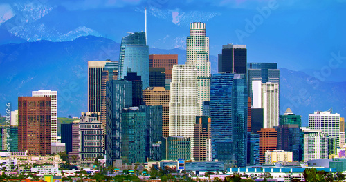 Los Angeles Downtown financial and business towers skyscrapers skyline and mountains in the background, California, 4K