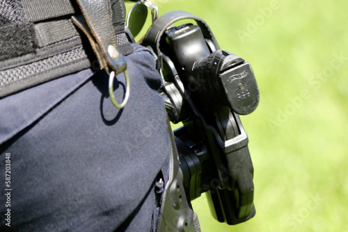Walther p99 gun on the belt of an agent of the Dutch police photo