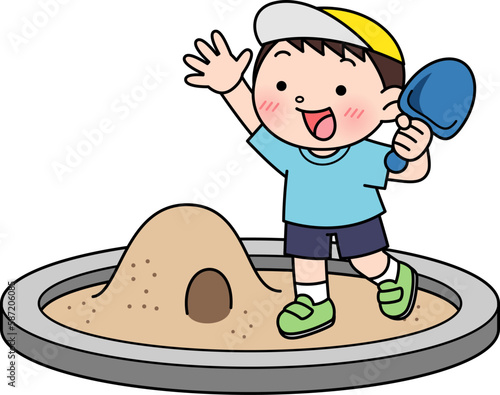 砂場で遊ぶ元気な男の子