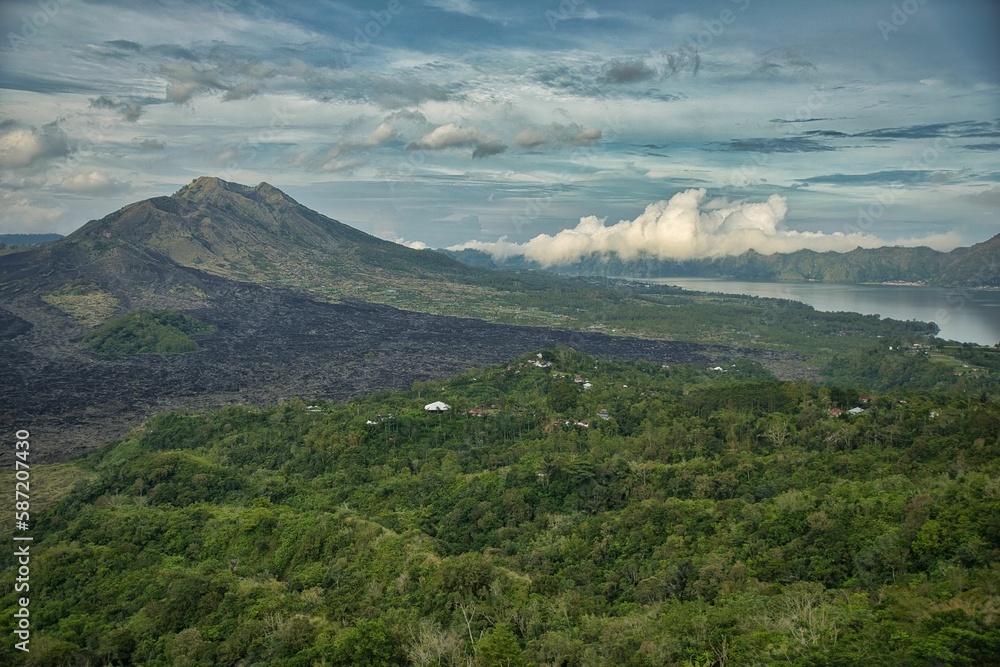 Epic view over the imposing landscape of the north of Bali in Indonesia, with its majestic mountains and green hills.