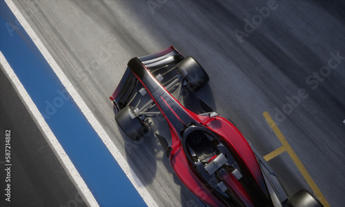 Overhead high angle view of a red modern generic sports racing car driving out from pitlane garage, cinematic lighting. Daytime shot. Realistic 3d rendering