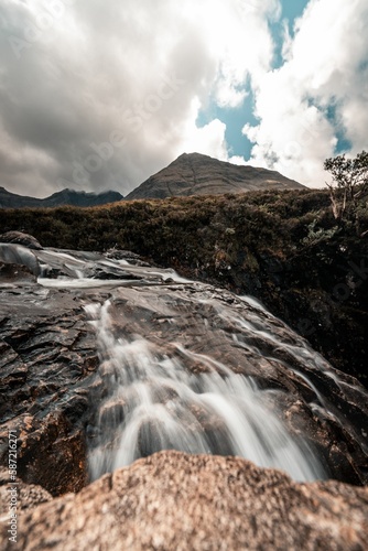 Waterfall on the Isle of Skye in Scotland © Timon Neuenbauer/Wirestock Creators
