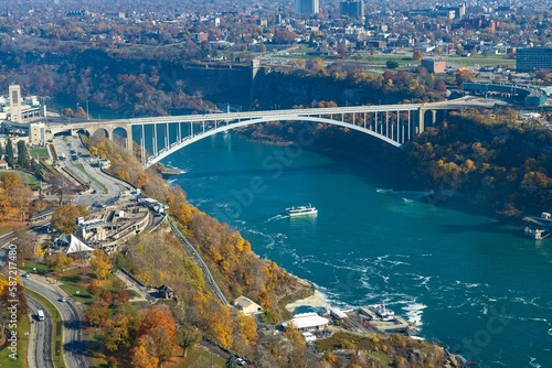 Aerial shot of the Rainbow arch bridge over the Niagara river in the city of Niagara Falls