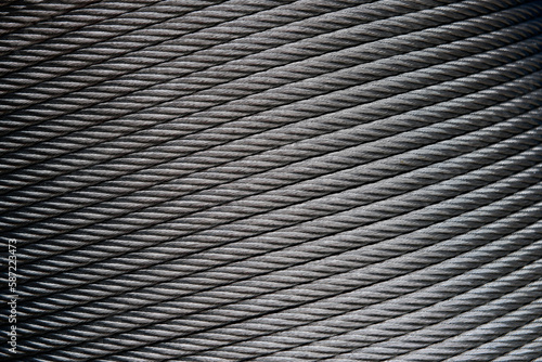 Wrapped metal rope. Lubricated steel rope.
Oily rope.