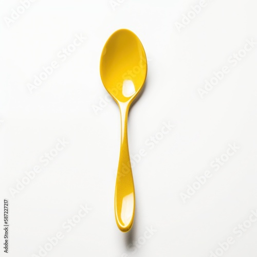 yellow spoon isolated on white background © Thibaut Design Prod.