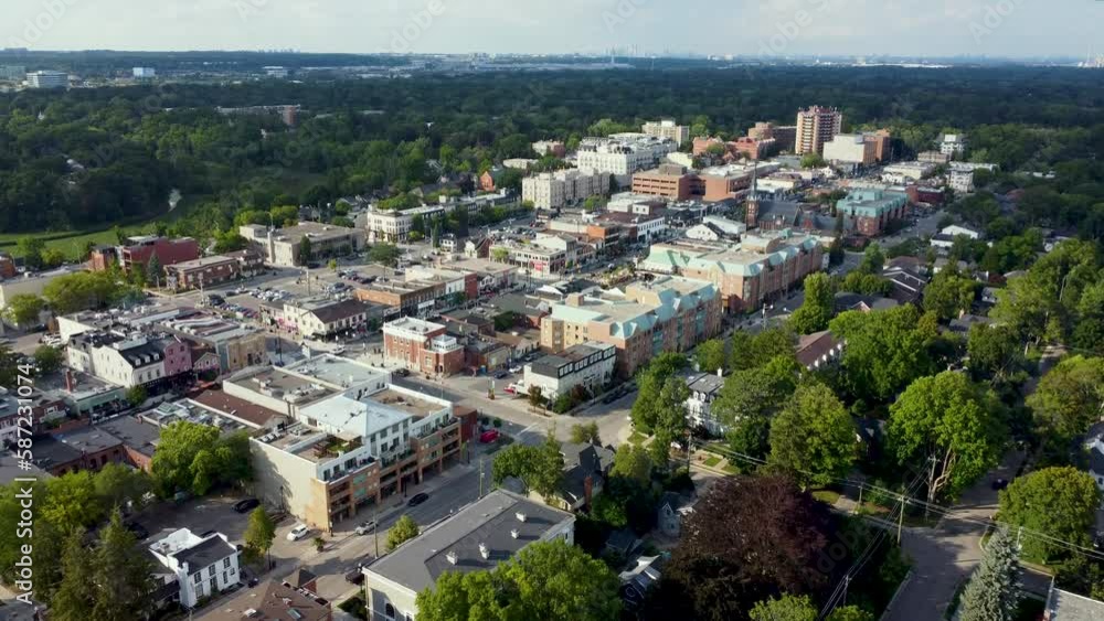 Drone flying towards downtown shopping area on the lakeshore of Oakville. Drone flying towards downtown shopping area on the lakeshore of Oakville.