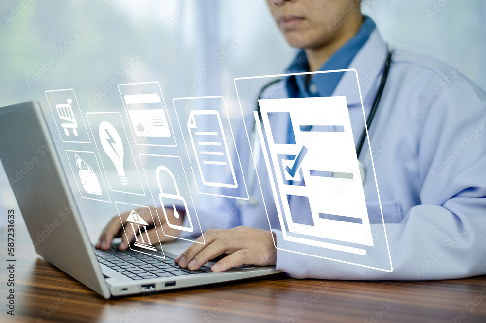 Doctor using technology document management on computer system management for cardiologist Specialist in treating heart disease for treatment in hospital , DMS document management concept Doctor using technology document management on computer system management for cardiologist Specialist in treating heart disease for treatment in hospital , DMS document management concept