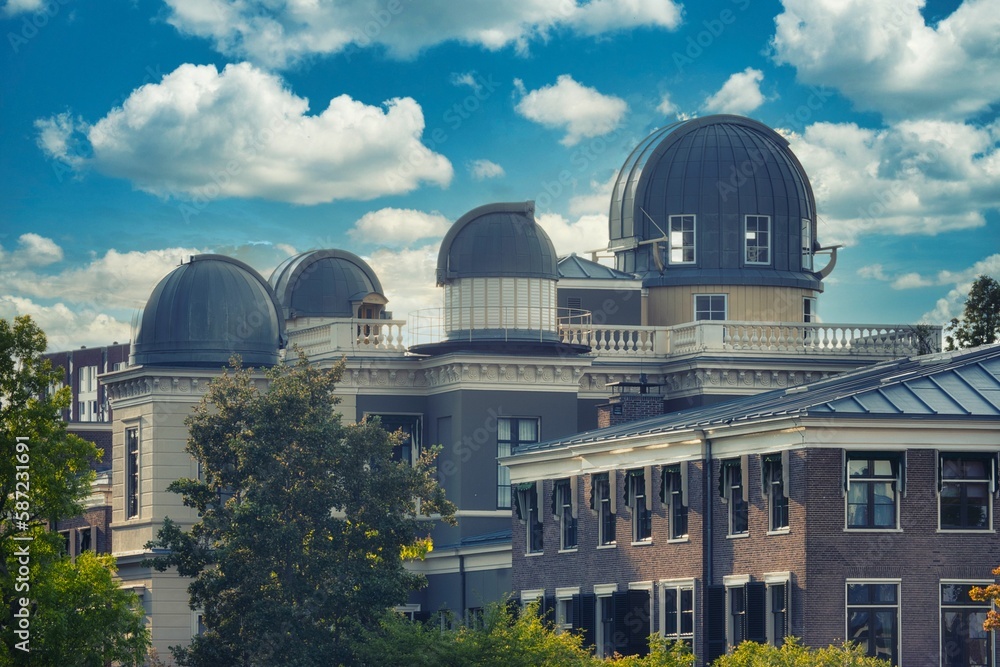 Obraz premium Leiden Astronomical Observatory with a cloudy blue sky in the background, Leiden, the Netherlands