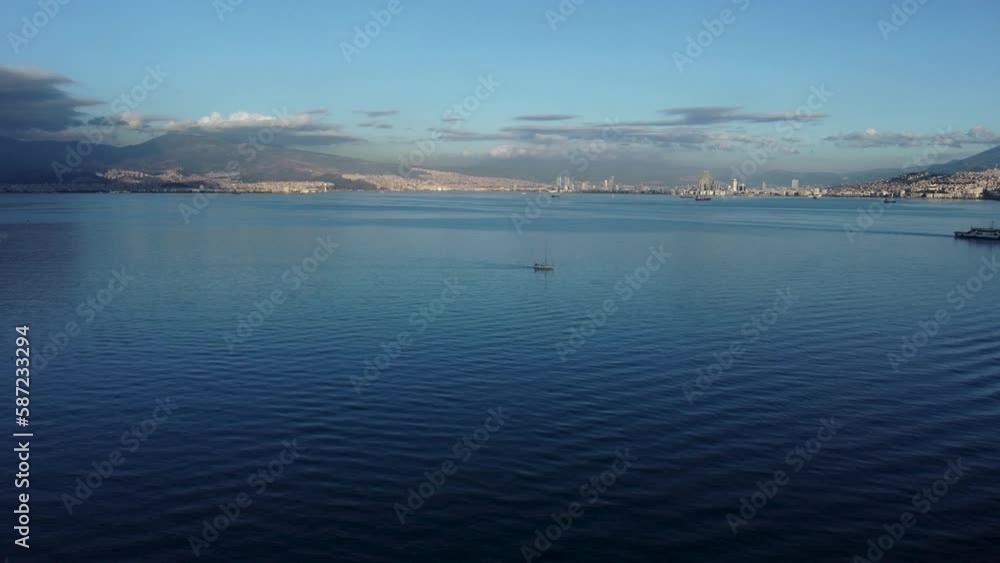 Aerial view of boats and ships with a beautiful view of the city at the bay of Izmir Aerial view of boats and ships with a beautiful view of the city at the bay of Izmir