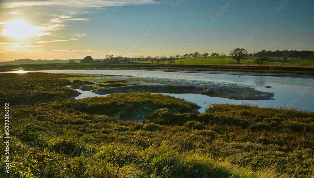 Beautiful view of the rural English nature reserve at sunset in Suffolk, England
