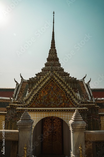 Vertical shot of the Grand Palace in the streets of Bangkok, Thailand during the day