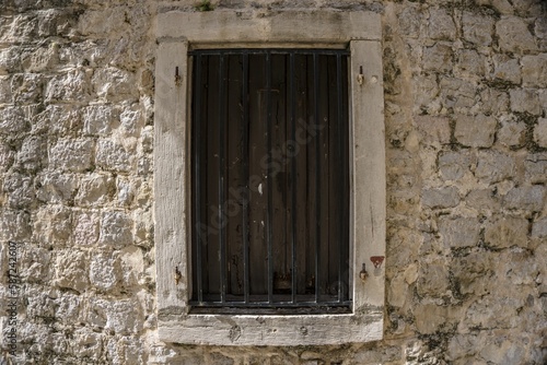 Closeup view of a window on brick wall building
