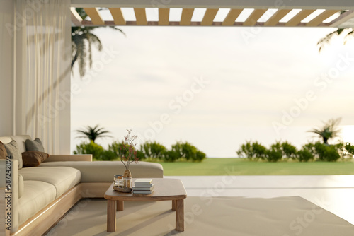 Side view of a beautiful outdoor relaxation lounge exterior design with comfortable couch © bongkarn