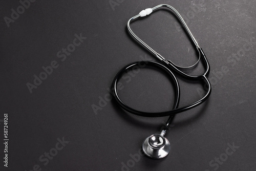 Stethoscope on dark background. healthcare and medical concept.