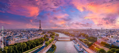 Beautiful aerial pink sunset over Paris, France. Magical aerial view of Paris. © ingusk
